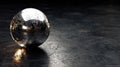 Shiny Chrome Sphere on Textured Dark Surface Royalty Free Stock Photo