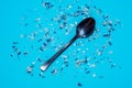 Spoon with microplastics Royalty Free Stock Photo