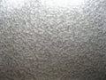 Silvery structured texture of a metal surface Royalty Free Stock Photo