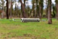 Metallic tension spring attached to electric fence Royalty Free Stock Photo