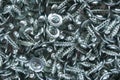 Metallic texture background. Screws and cogs. Tools for fixing and repairing. Stainless steel bolts. Galvanized metal fasteners. Royalty Free Stock Photo