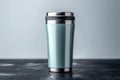 Metallic thermo cup with warm beverages, stainless steel container concept Royalty Free Stock Photo