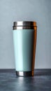 Metallic thermo cup with warm beverages, stainless steel container concept Royalty Free Stock Photo