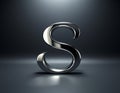 A metallic, three-dimensional letter \