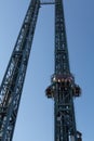 Metallic Tower in the Amusement Park: Crazy Speed Uphill and Downhill Royalty Free Stock Photo
