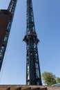 Metallic Tower in the Amusement Park: Crazy Speed Uphill and Downhill Royalty Free Stock Photo
