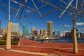 Metallic tubes frame the Baltimore, Maryland skyline