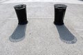 Metallic waste bins on a concrete surface Royalty Free Stock Photo