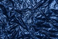 Metallic wrapping paper. Classic blue color of the year 2020. Overlapping glowing and twinkling spots decorative