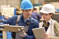 Metallurgic workers checking on production Royalty Free Stock Photo