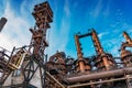 Metallurgical plant or factory blast furnace and smokestacks. Industrial iron background