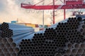 Metallurgy industry concept. Many steel pipes stacked. 3D rendered illustration.