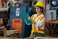 Metalwork manufacturing factory inspection with female engineer. Exemplifying