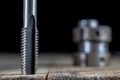 Metalwork tools on the workshop table. Threading dies and taps i Royalty Free Stock Photo