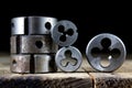 Metalwork tools on the workshop table. Threading dies and taps i Royalty Free Stock Photo