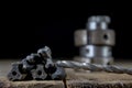 Metalwork tools on the workshop table. Threading dies and taps i Royalty Free Stock Photo