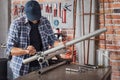 Metalworker tightening a bolt or clamp