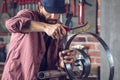 Man doing metalwork in a workshop Royalty Free Stock Photo