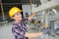 Metalworker woman in factory
