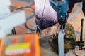 Metalworker working on a drilling machine