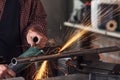 Metalworker working in an engineering workshop Royalty Free Stock Photo