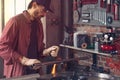 Metalworker working in an engineering workshop Royalty Free Stock Photo