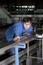 Metalworker working in fabric Royalty Free Stock Photo