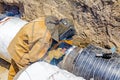 Metalworker working on a pipeline