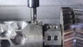 Metalworking cutting process by milling cutter. Media. CNC machine processes metal detail. Close-up of the metal Royalty Free Stock Photo