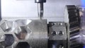 Metalworking cutting process by milling cutter. Media. CNC machine processes metal detail. Close-up of the metal Royalty Free Stock Photo
