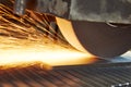 Metalworking industry. finishing metal surface on horizontal grinder machine Royalty Free Stock Photo