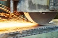 Metalworking industry. finishing metal surface on horizontal grinder machine Royalty Free Stock Photo