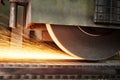 Metalworking industry. finishing metal surface on horizontal grinder machine Royalty Free Stock Photo