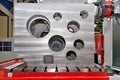 Large rectangular steel part with holes of various diameters