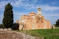 Metamorphosis Sotiros church in Pylos Nestor Palace Niokastro Navarino and trees in Greece at sunny day with blue sky