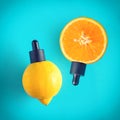 Metaphor, bottle with serum, oil in citrus, orange, lemon. The concept of vitamin C in cosmetics and aromatherapy