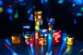 Metaverse, future, digital technology concept. Wooden constructor blocks on abstract multicolored neon lights background