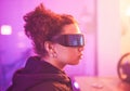 Metaverse, virtual reality and girl for gaming innovation, vr media and neon lighting at night. Female gamer, cyberspace