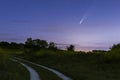 Meteor, shooting star or falling star seen in a night sky with clouds. Comet NEOWISE, C/2020 F3 Royalty Free Stock Photo