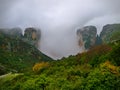 Meteora, Greece, winter dramatic landscape with heavy clouds and foggy mountains. Vibrant colorful nature Royalty Free Stock Photo