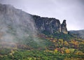 Meteora, Greece, winter dramatic landscape with heavy clouds and foggy mountains. Vibrant colorful nature Royalty Free Stock Photo