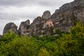 Meteora - Hiking trail through the forests near tourist village Kastraki on a mystical cloudy day in Kalambaka, Meteora