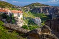 Meteora monasteries, Greece. Panoramic view on the Holy Monastery of Varlaam placed on the edge of high rock. The Meteora area is Royalty Free Stock Photo