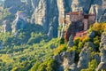 Meteora monasteries. Unique Panoramic view on the Roussanou Monastery placed on the edge of high rock. The Meteora area is on Royalty Free Stock Photo