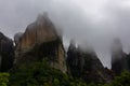 Meteora - Panoramic view of unique rock formations near Holy Monastery of Varlaam  on cloudy foggy day in Kalambaka, Meteora Royalty Free Stock Photo