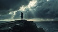 The meteorologist stands on a cliff with brooding storm clouds behind them and rays of sunlight breaking through in