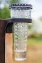 Meteorology with rain gauge in garden