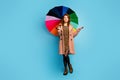 Meterology say rainy weather concept. Full size photo positive woman hold open parasol use cellphone look copyspace wear Royalty Free Stock Photo