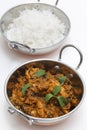 Methi chicken and rice in kadai bowls vertical Royalty Free Stock Photo