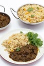 Methi gosht and tomato biriyani meal vertical Royalty Free Stock Photo